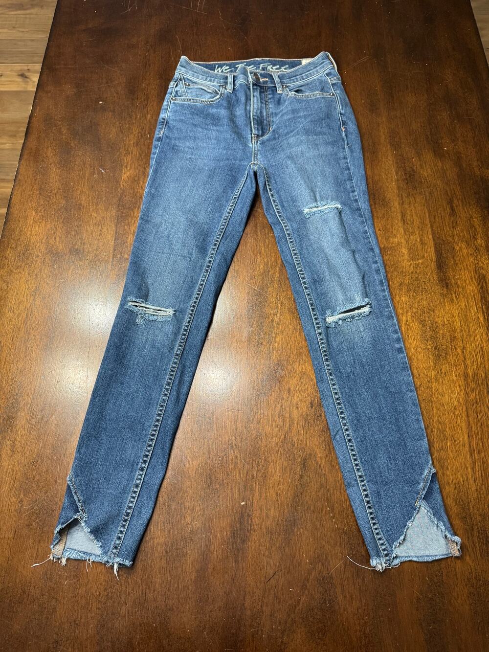 We The Free Dark Blue Distressed Skinny Jeans